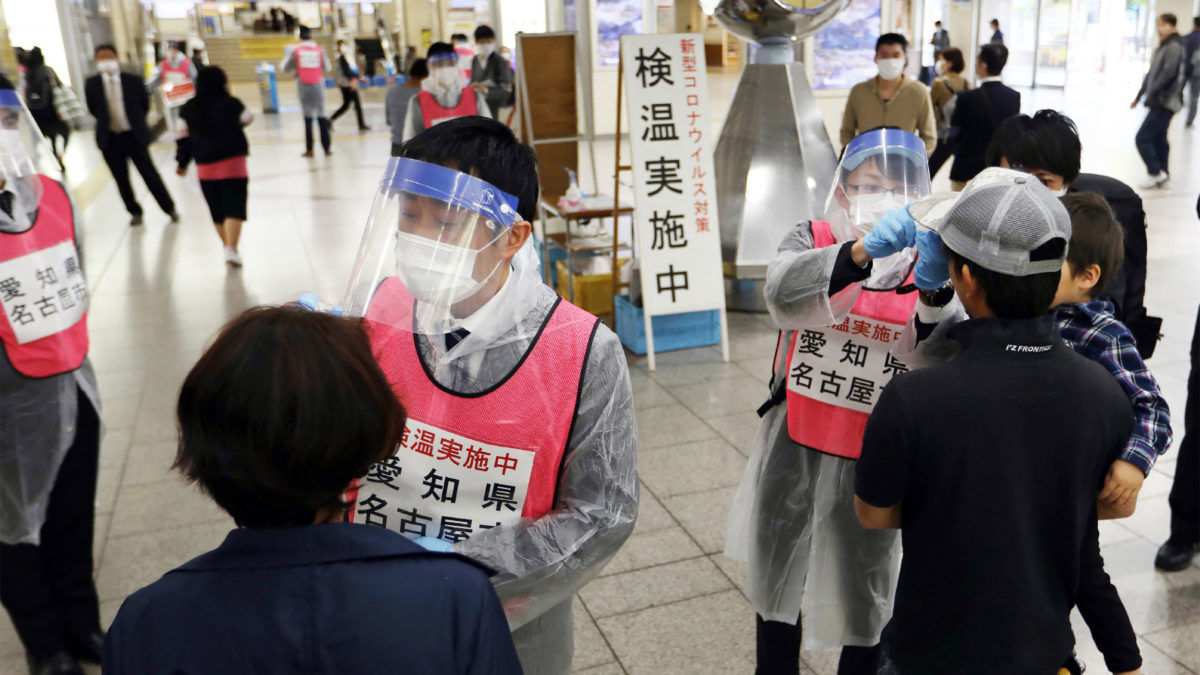 Japan reports nearly 200 new infections as total cases near 15,000