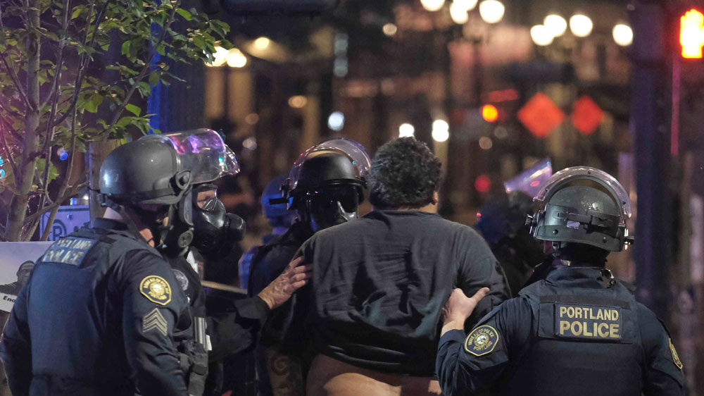 Portland’s police arrested 12 people last night